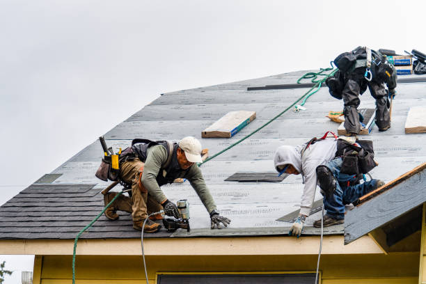 Professional Gutter Installation technician working in Shelburne Falls, MA